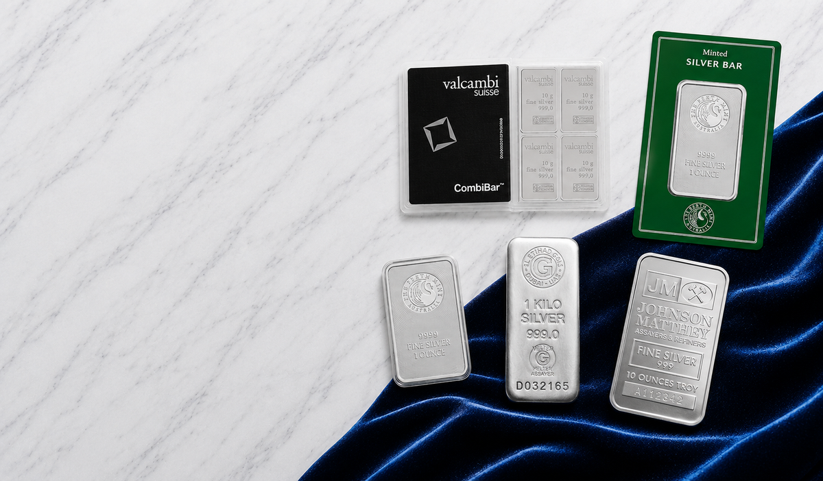 variety of silver bars on white and blue background