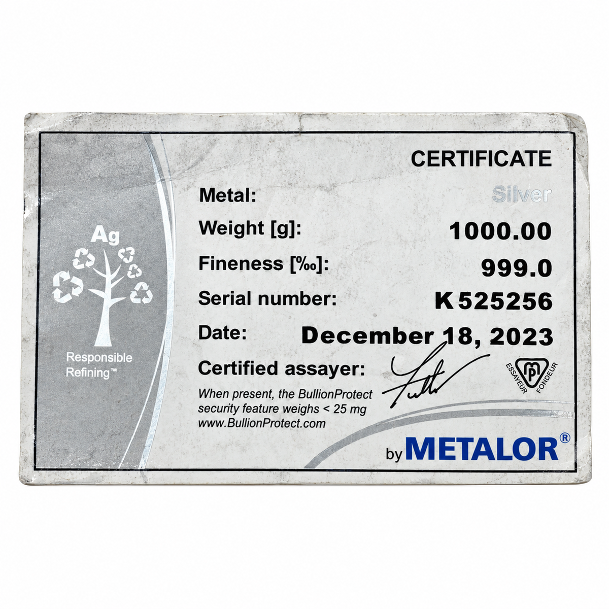 Original Metalor assay certificate for a 1kg 999 fine silver cast bar showing weight, purity and identification details.